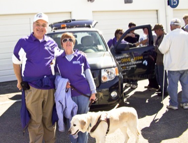 Mary Kozy holds one of the high-tech gloves of the Blind Driver. (Photo provided)