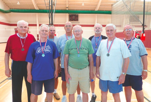 Team players representing Huntley in the Volleyball Tournament, left to right: Ron Williams, Rich Desmond, Cary Niewold, Roger Tomlinson, Tom Maher, Dave Keys (Mgr), Ken Sunderman and Bob Ruckoldt. (Photo provided)