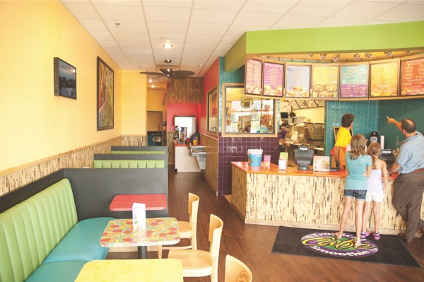 Tropical Smoothie Café recently celebrated its grand opening in Huntley and has been open less than a month but already has residents lining up to take a trip to the “tropics” at lunchtime. (Photo by Chris LaPelusa/Sun Day)