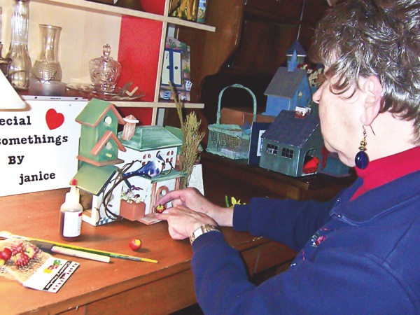 Neighborhood 20 resident Janice Strain makes and decorates interesting bird houses for sale from her home. (Photos by Kay Clark/Sun Day)