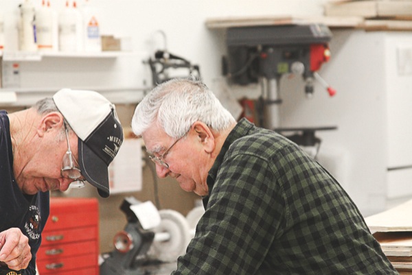 Woodchucks Ron Wiedenfeld (right) and Jerry Mecozzi work on the Cinderella stage. (Photo by Chris LaPelusa/Sun Day)