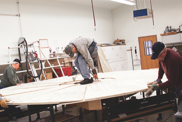 Woodchucks build the revolving stage for The Theatre Company of Sun City’s upcoming Cinderella production. (Photo provided)