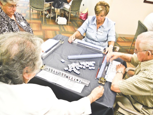 Members of the Mah-Jongg club of Sun City play a game during the annual tournament on June 28. (Photo by Marek Makowski/Sun Day)