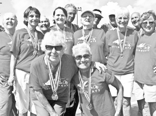 The Sun City Sting Rays celebrate their outstanding performances at the 2012 Six-County Senior Olympic swimming competition. Kneeling, from left: Joan Souchek and Joanie Koplos. Second row, from left: Margaret Liedtke, Ginny McCann, Sandra Lott, Anne Broderick, Phyllis Nordlof, and Sandy Sterling. Back row, from left: Caryl Fabian, Len Lencioni, Pat Hatton, Joe, Loughlin. Not pictured: Art Fitzgerald. (Photo provided)