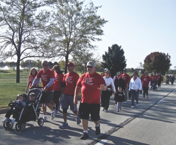 Approximately 200 people participated in the Breast Cancer Support Hour’s 5k cancer walk through Sun City at Huntley’s Fall Fest. (Photo provided)