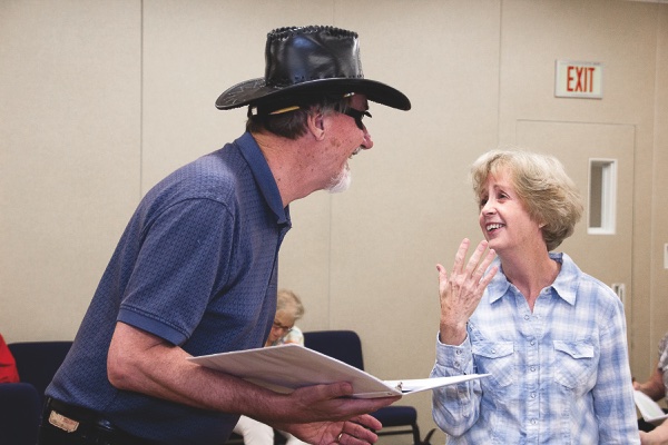 Red Velvet Cake War cast members Dick Storer and Diane Scott execute a scene at rehearsals. (Photo by Tony Pratt/Sun Day)