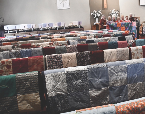 Led by Nancy Morbeck, this volunteer group sews hundreds of quilts for recipients all over the world. (Photos by Christine Such/Sun Day)