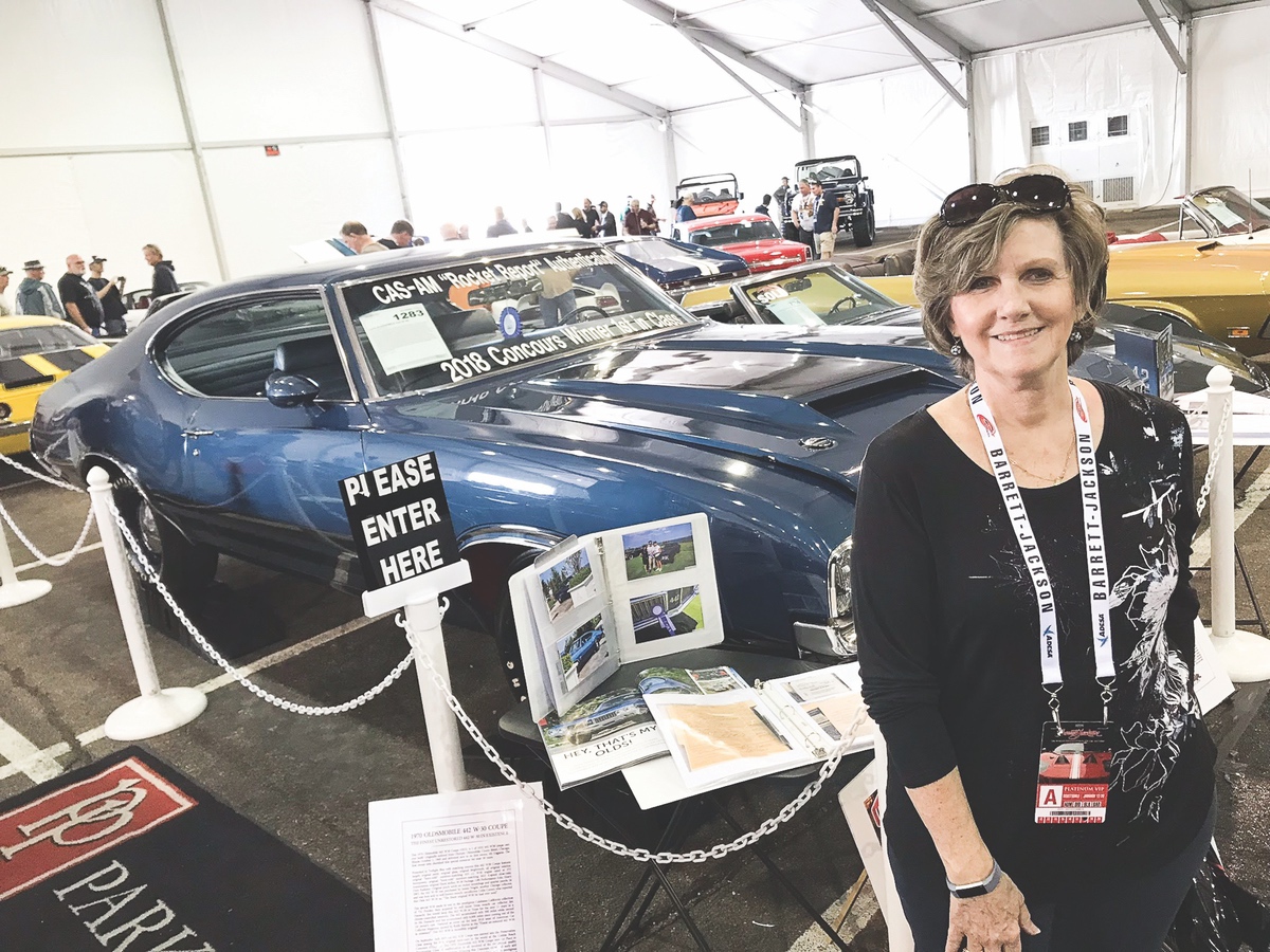 Parsla Gagainis poses with her late husband Vilanis’s 1970 Oldsmobile 442 W-30 at the Barrett-Jackson Auction in Scottsdale, Arizona. (Photo provided)