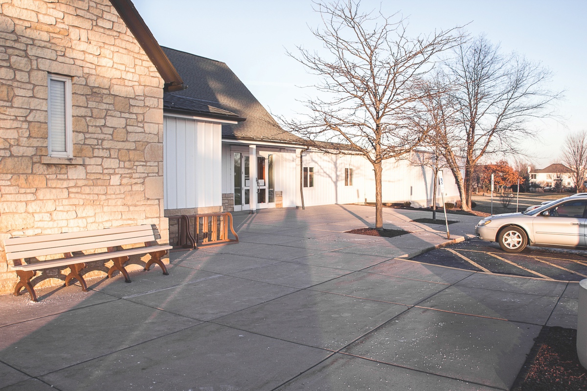 These trailers (far right) that now house the Huntley Library District’s childrens and programming activities, will be removed and replaced if the Library’s April 2 expansion referendum is approved by voters. (Photo by Tony Pratt/Sun Day)