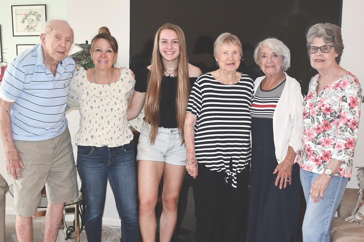 Lucille ‘Lulu’ Winkelman (third from right) was born in 1913 to a family of farmers. She was brought up from a young age to always look forward. (Photos by Christine Such/Sun Day)