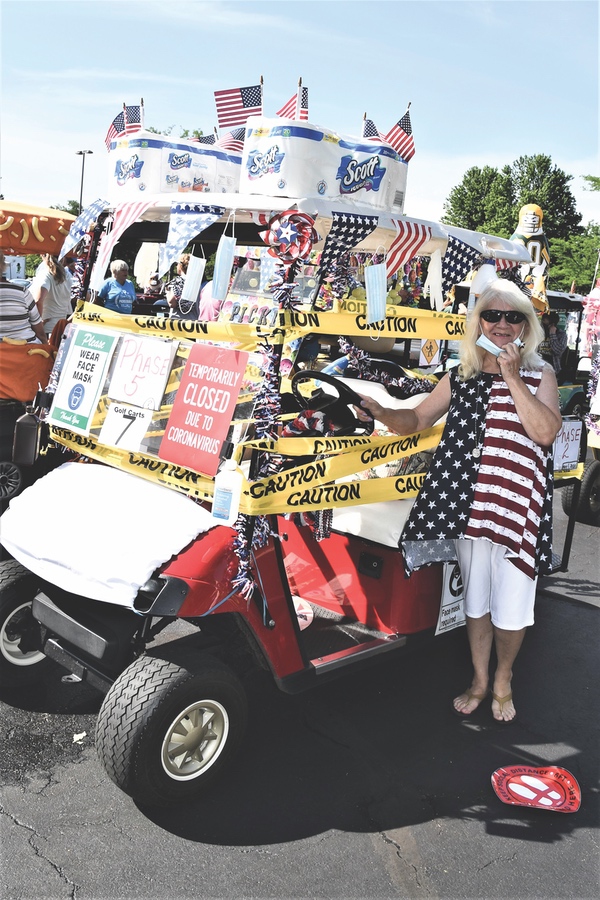 Sandy Deacon and her Covid-19 golf cart entry.