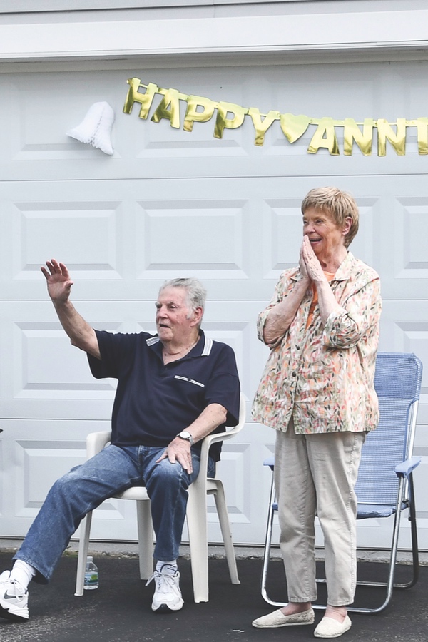 Barb and Pat Freeman receive a welcomed surprise with a drive-by anniversary celebration. (Photos by Christine Such/Sun Day)