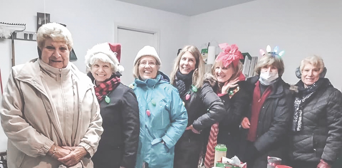 Diane Tarrant (left) with cool neighbors who step up during the pandemic. (Photo provided)