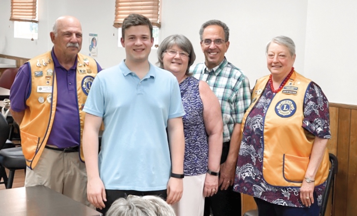 Scholarship winner Michael King alongside his parents and Lions Club President Jim Saletta and Lions Secretary Carol Santee. (Photos provided)