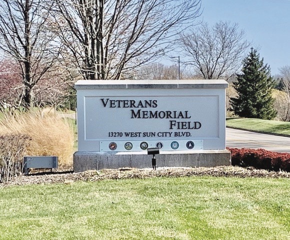 The new sign for the Veterans Memorial Field is in place in time for Veterans Day celebrations. The former Eakin Field sign was simply updated with new lettering identifying the new name for the softball field. The cost of the new lettering was quoted in August at $8,380. (Photo by David Goode/My Sun Day News)