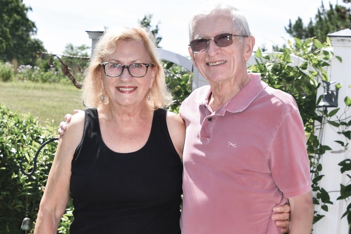 Tom Schlechter with wife Erika. Tom has been a pool monitor at the Meadow View pool for 10 years. He is described as being calm and upbeat, making him perfect for the position. (Photo by Christine Such/My Sun Day News)