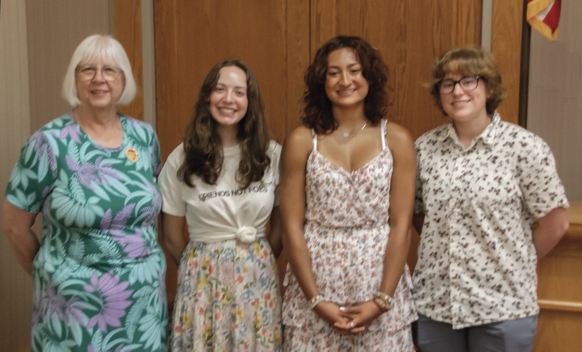 Darlene Pratt (far left) stands with Sunflower Garden Club scholarship recipients (L to R) Emma Swiersz, Sophie Amin and Madelyn Hanson. (Photo by Tony Pratt/My Sun Day News)