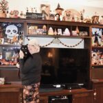 Sun City resident Lucy Tracy is ready for a Haunting Halloween with her cat Tanky. (Photo by Christine Such/My Sun Day News)