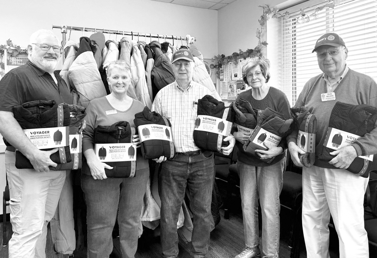 Rotary Club provides new coats to Grafton Food Pantry. Members (L to R) Jim Drendel, Gloria Newman from Grafton Food Pantry, Jim Uszler, Nancy Huftey and Rudi Welvers. (Photo provided)