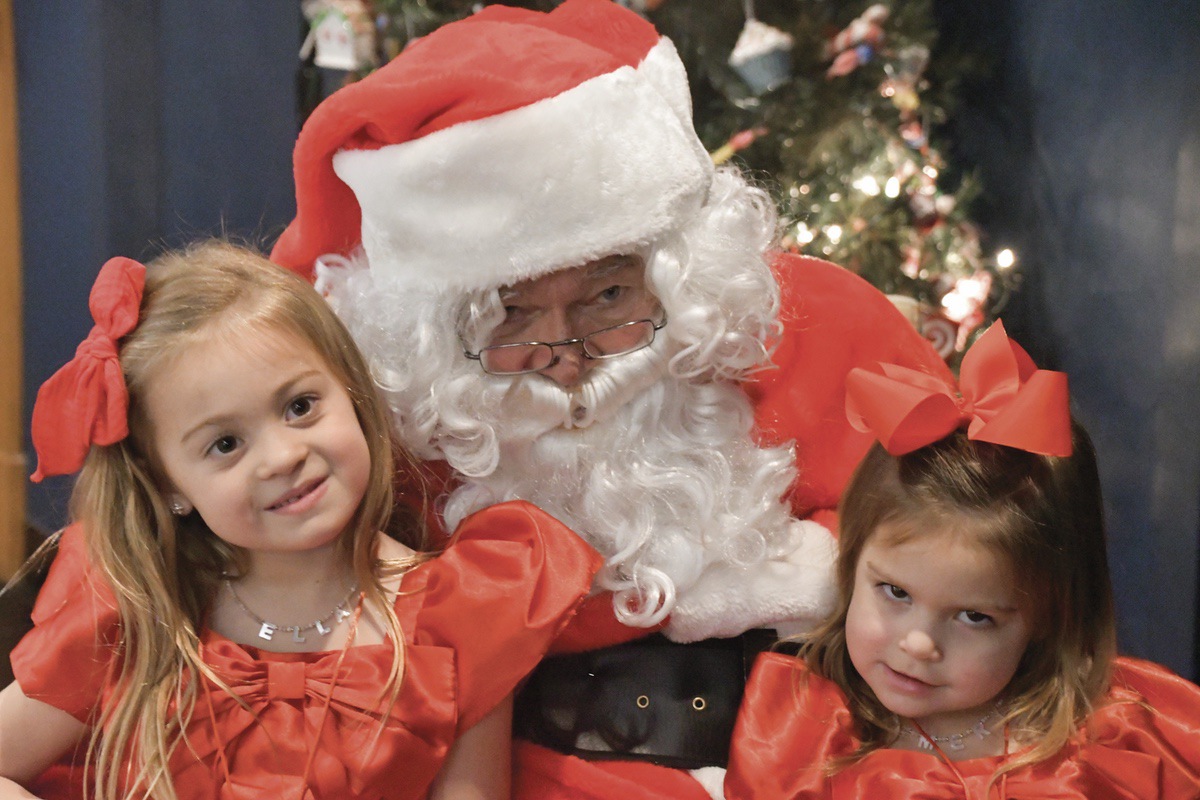 Ella Pomagier (left) with sister Emery share their secret wishes with Santa at the GG&Me Breakfast with Santa. (Photo by Christine Such/My Sun Day News)