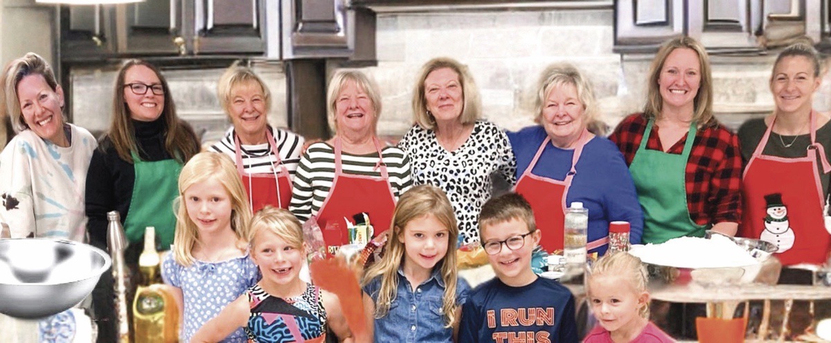 Three generations of the Dungey family baking Christmas cookies, a tradition that spans 42 years. (Photo by Christine Such/My Sun Day News)