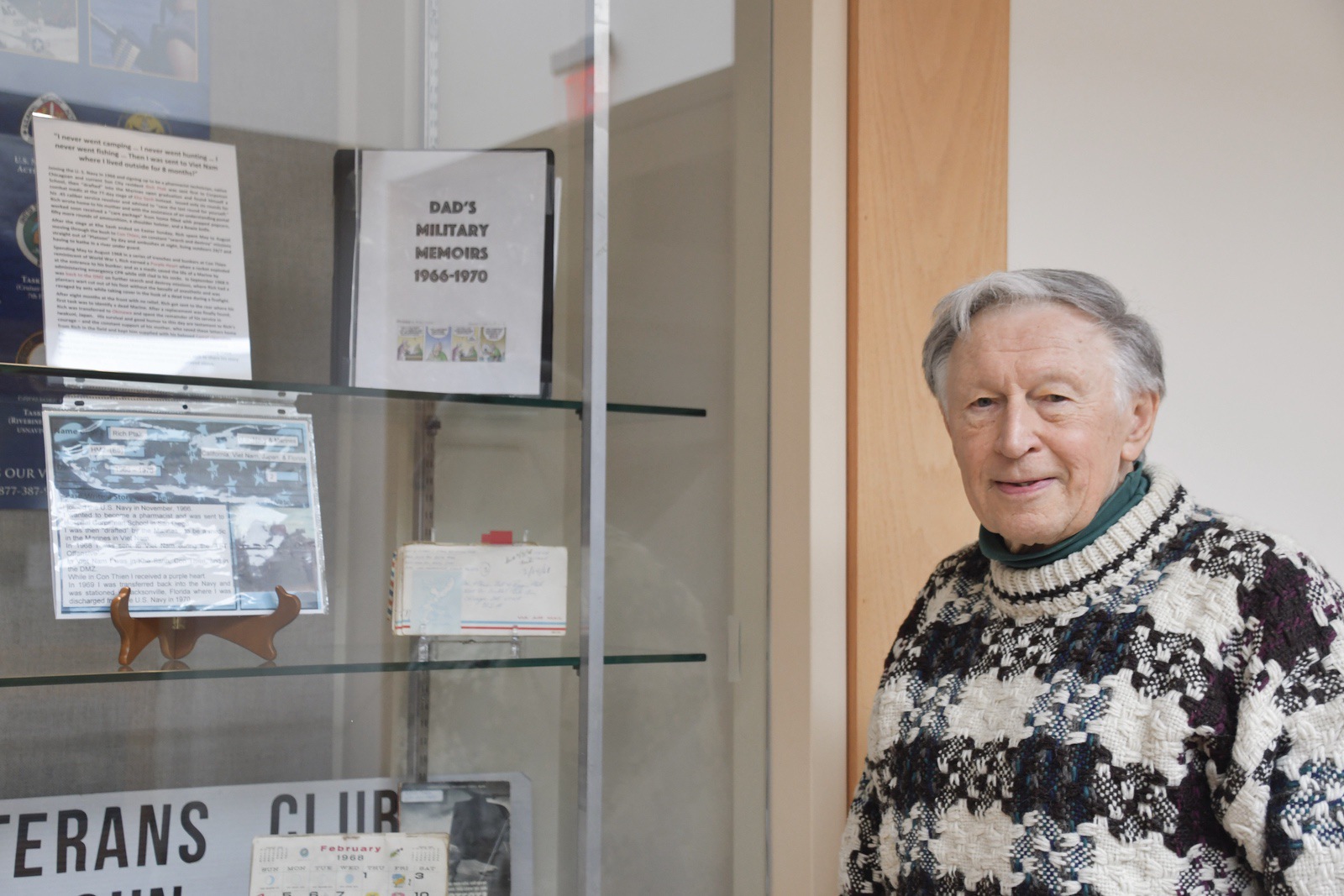 Sun City resident and veteran Rich Ptak’s military memoirs are on display in Prairie Lodge. (Photo by Christine Such/My Sun Day News)