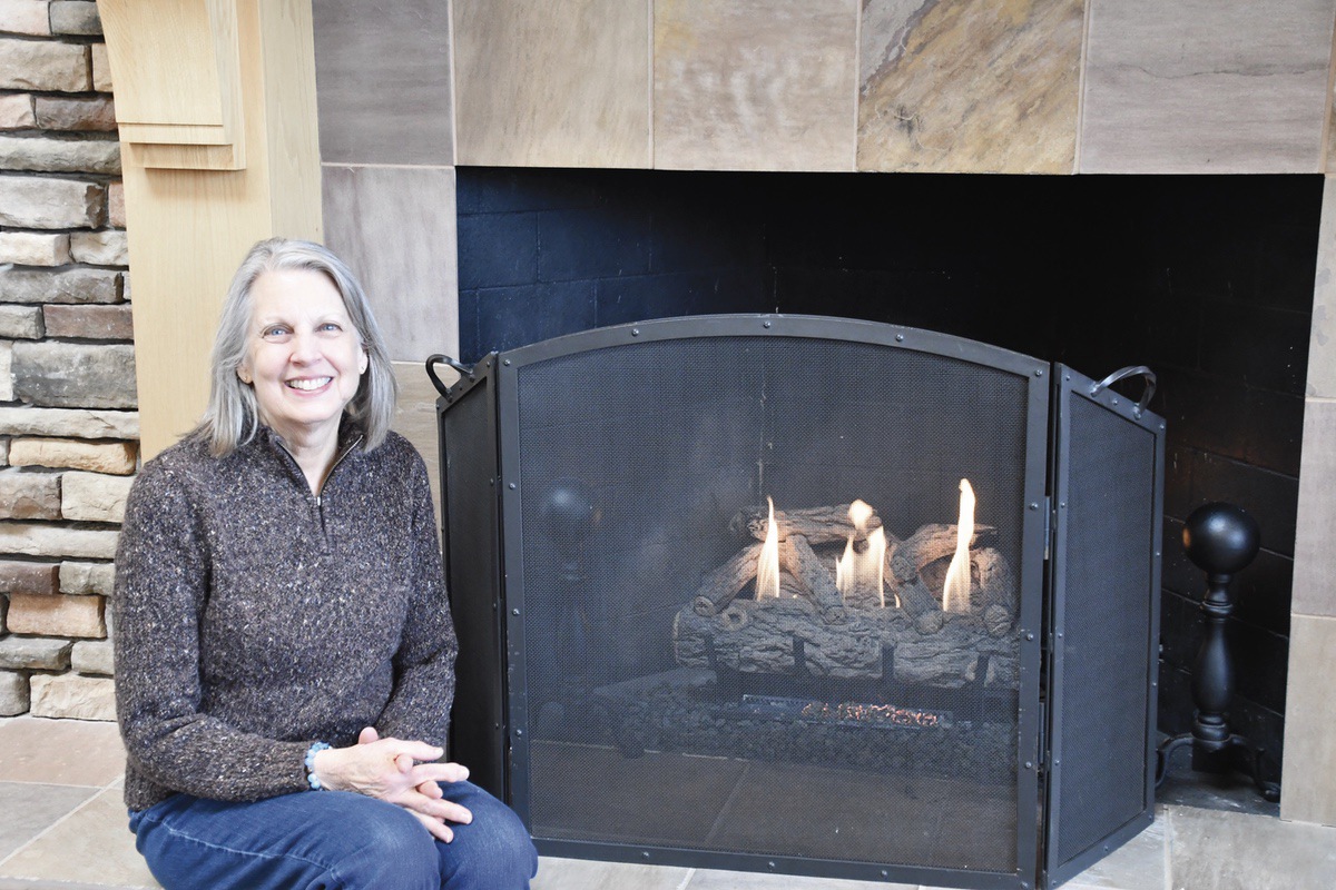 Marilyn Stucki’s love for animals led her to be a volunteer at Animal House Shelter for past six years. (Photo by Christine Such/My Sun Day News)